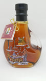 Mapleland Farms Maple Syrup in a bottle with artistic scene